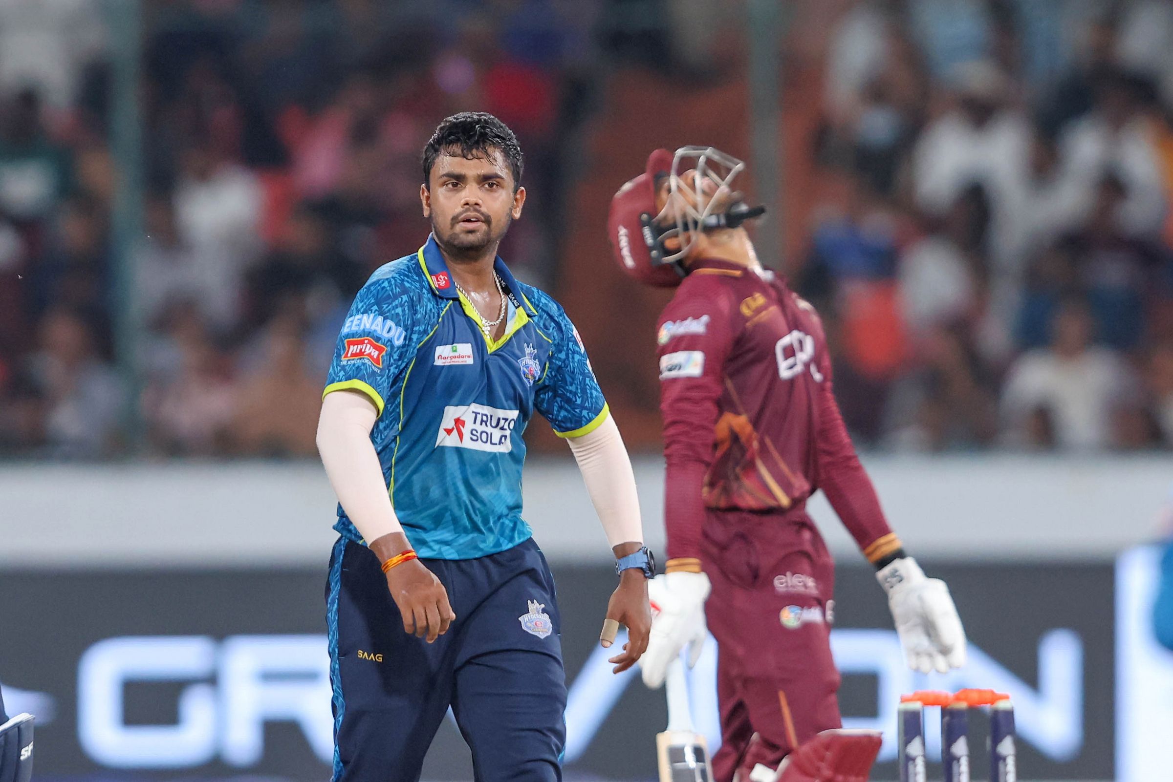 Shanmukha Ashwin of Hyderabad E-Champions after getting the wicket of Rahul Radesh of EIPL and Eleve Karimnagar Diamonds during the Qualifier 2 of the Sreenidhi University TG20