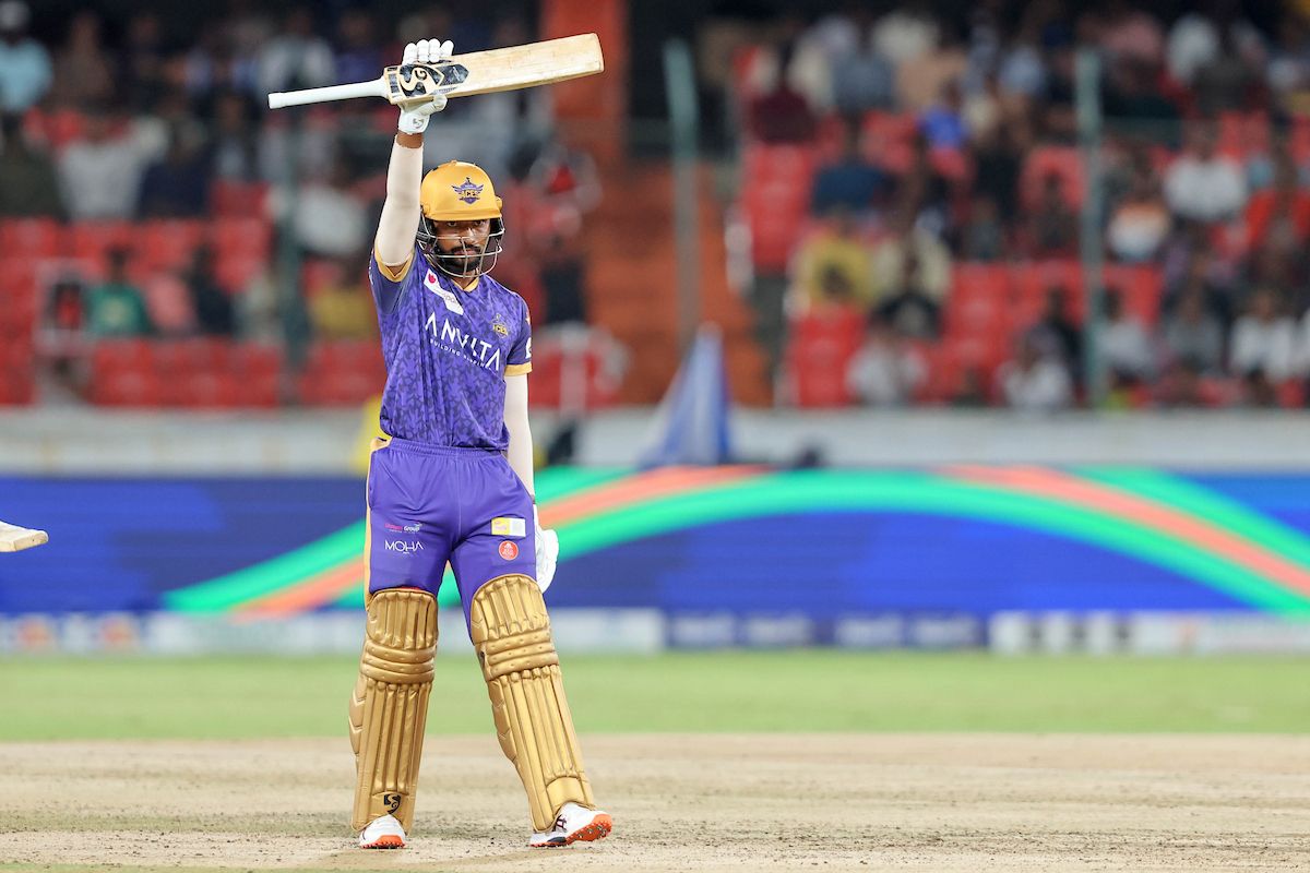 Himateja Kodimela of Anvita Khammam Aces raises his bat after scoring a fifty