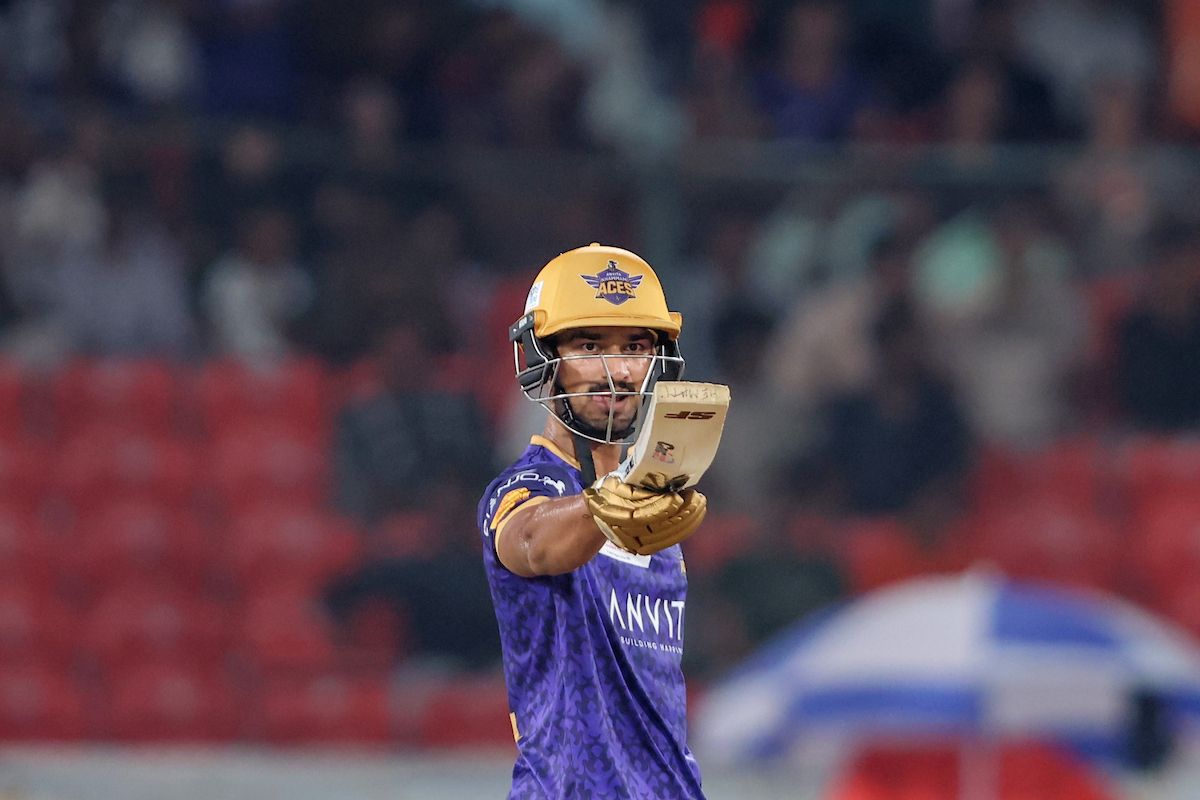 Mickil Jaiswal of Anvita Khammam Aces raises his bat after scoring a fifty 