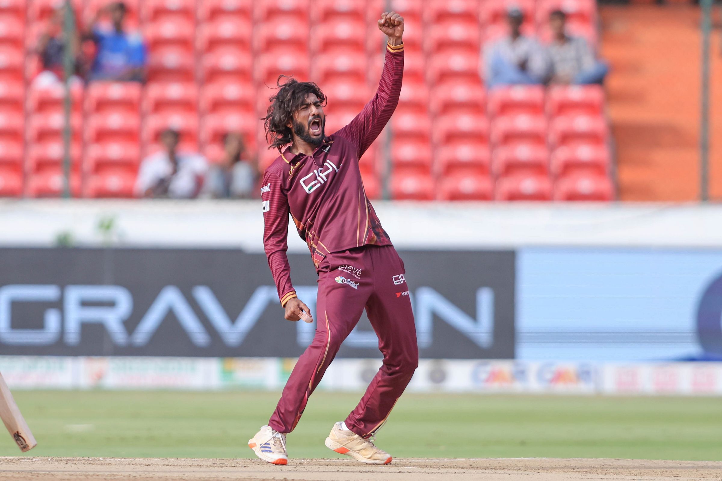 Shubham Sharma of EIPL and Eleve Karimnagar Diamonds celebrates the wicket of Aaron George Varghese of Ranga Reddy Risers during the Match 20 of the Sreenidhi University TG20