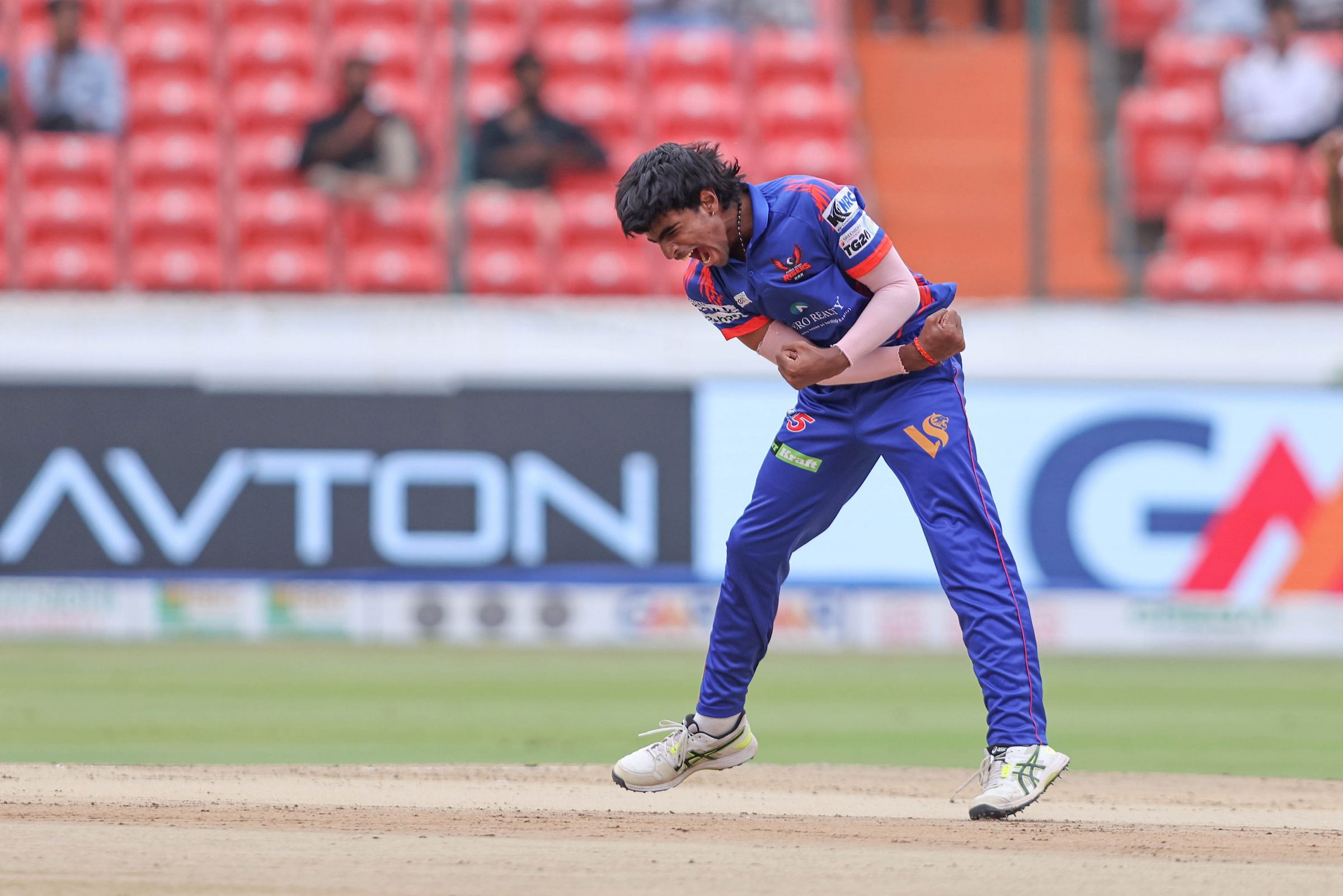 Tanay Jaddu of Ranga Reddy Risers celebrates the wicket of Tanmay Agarwal, Captain of EIPL and Eleve Karimnagar Diamonds during Match 20