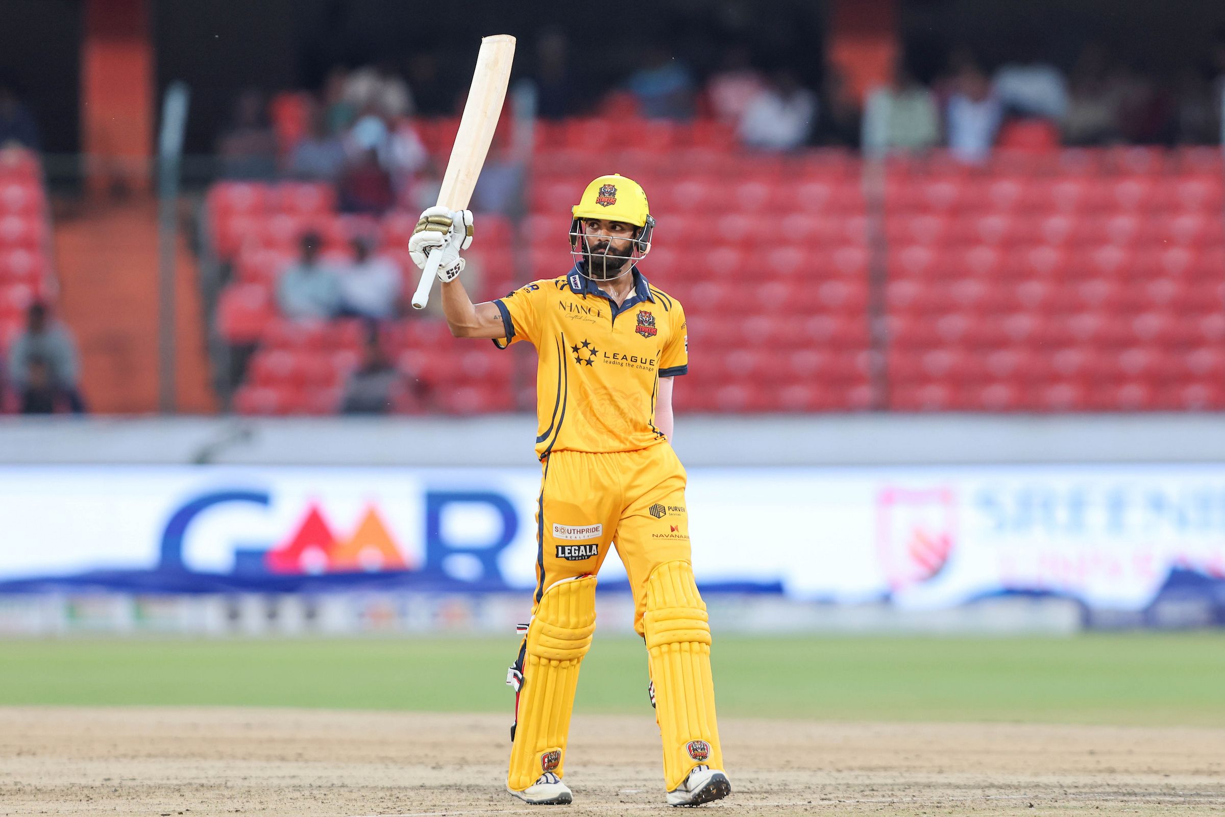 M Samhith Reddy of Palamuru Strikers raises his bat after scoring a fifty