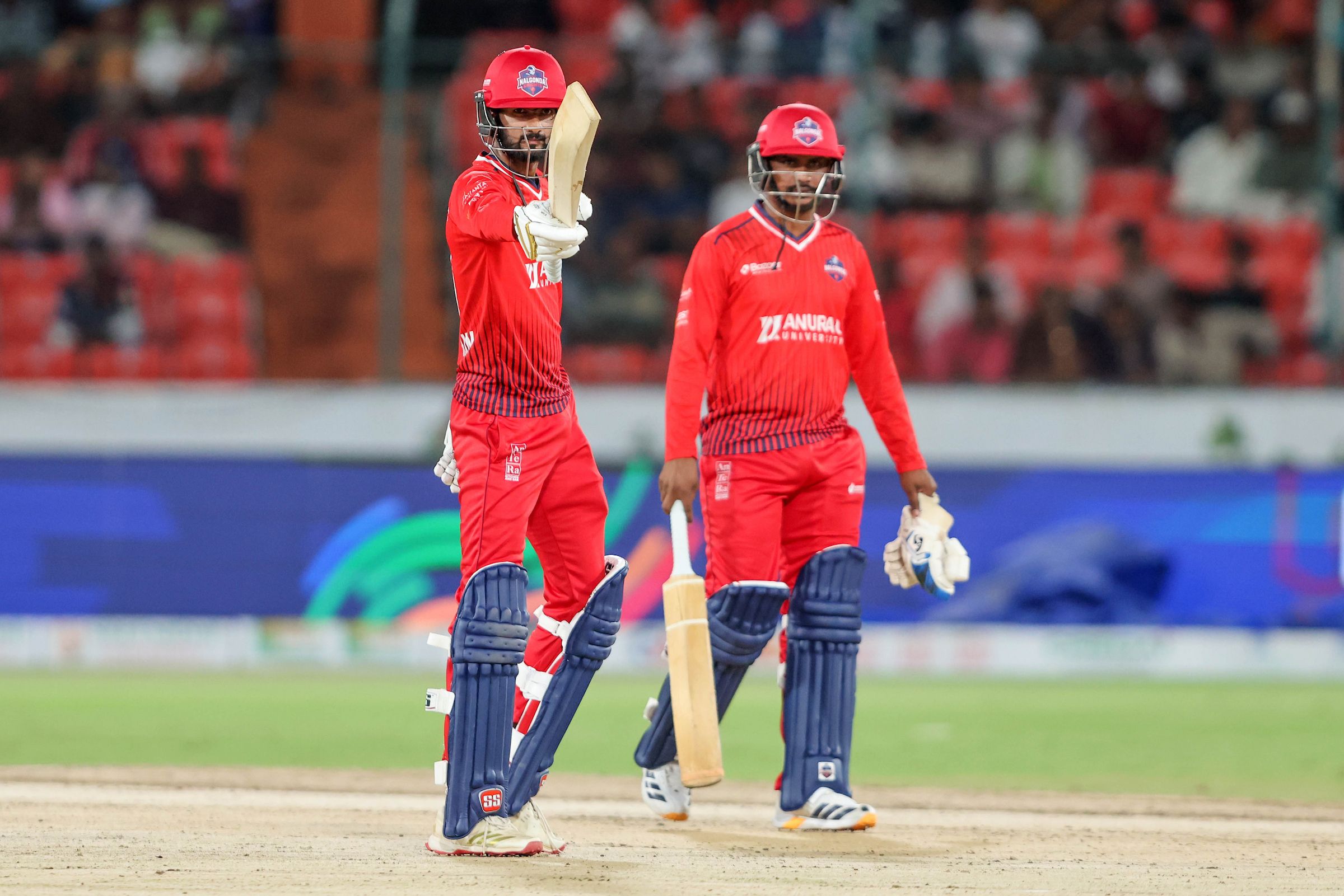 Varun Goud of Anurag Nalgonda Knights raises his bat after scoring a fifty during the Match 26 of the Sreenidhi University TG20 between Anurag Nalgonda Knights and Hyderabad E-Champions