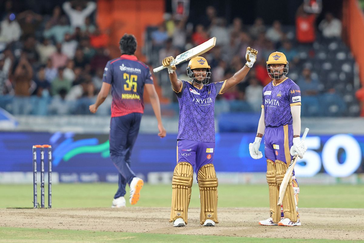 Gsk Reddy of Anvita Khammam Aces raises his bat after scoring a fifty