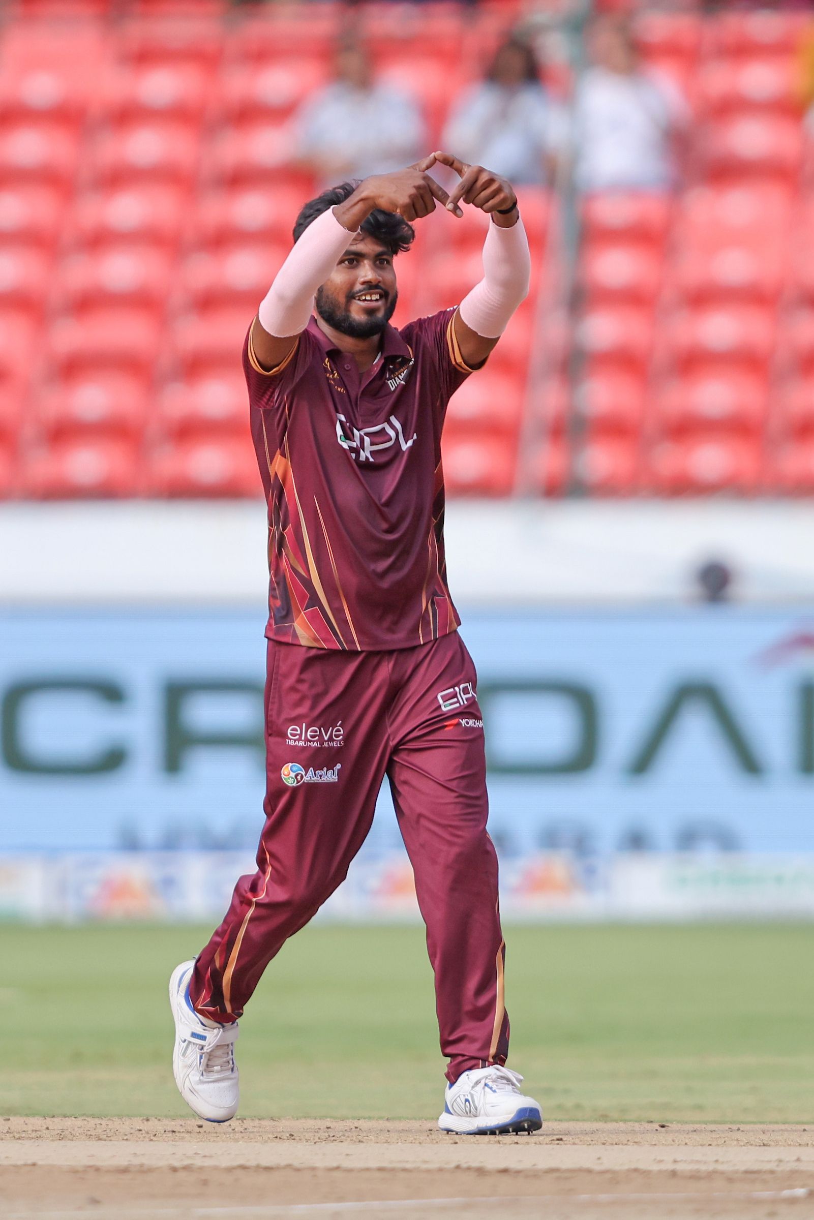 Rathlavath Dinesh of EIPL and Eleve Karimnagar Diamonds celebrates the wicket of Gnana Prakash Reddy of Ranga Reddy Risers during the Match 20 of the Sreenidhi University TG20