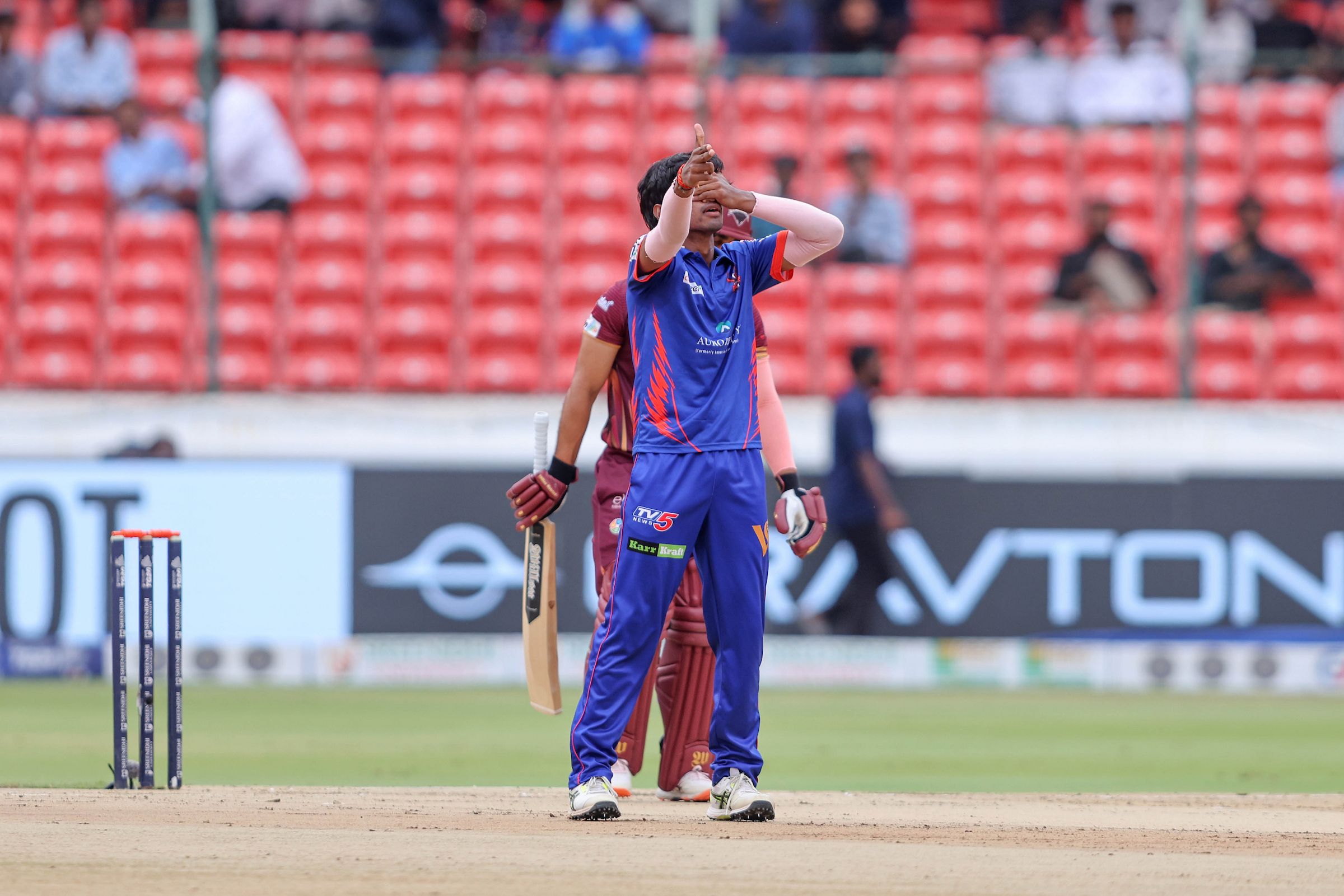 Tanay Jaddu of Ranga Reddy Risers celebrates the wicket of Tanmay Agarwal, Captain of EIPL and Eleve Karimnagar Diamonds during the Match 20
